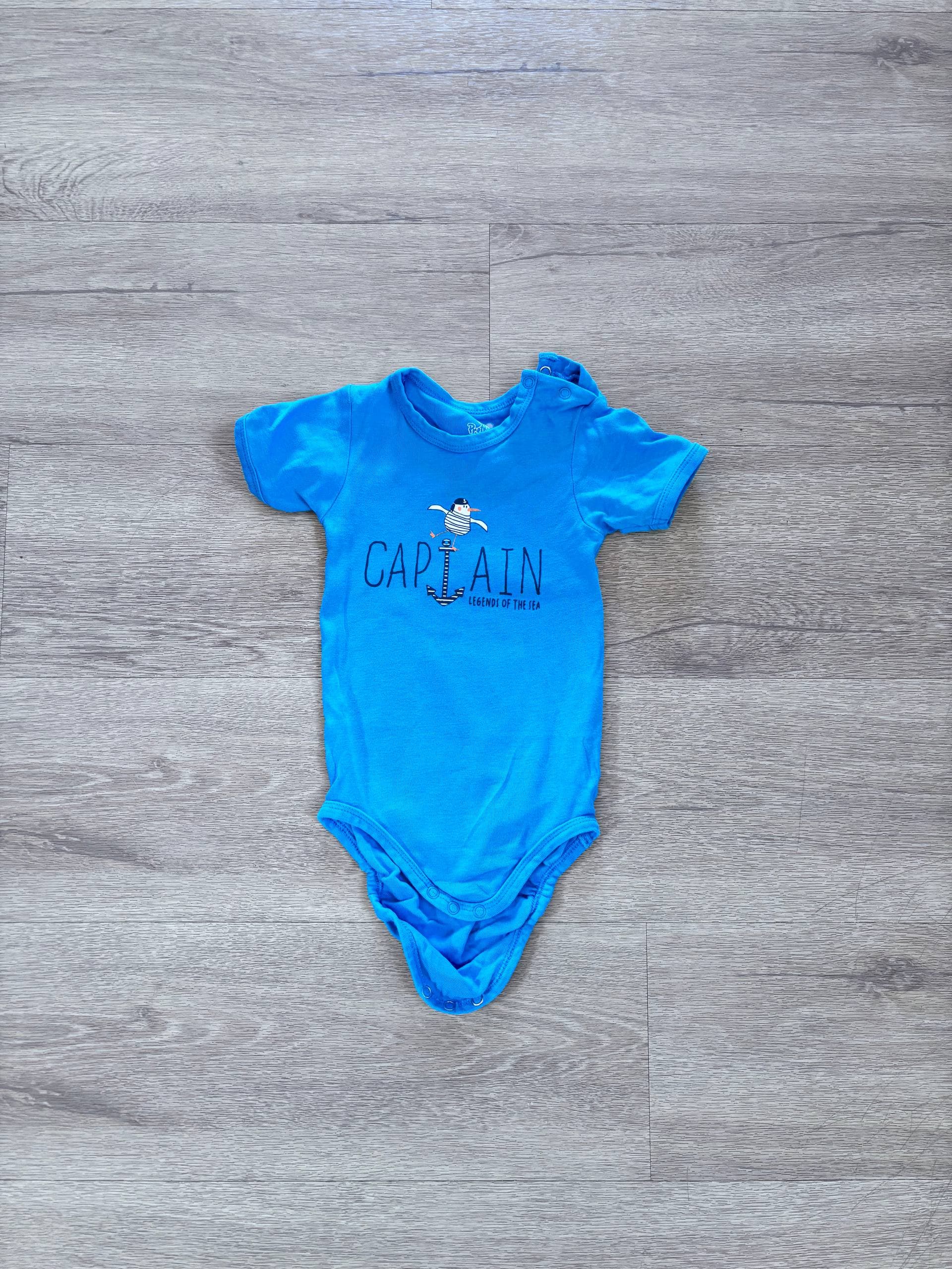 Modra majica s tiskom in gumbi